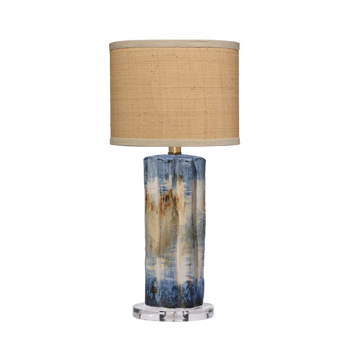 abstract ceramic table lamp with raffia shade