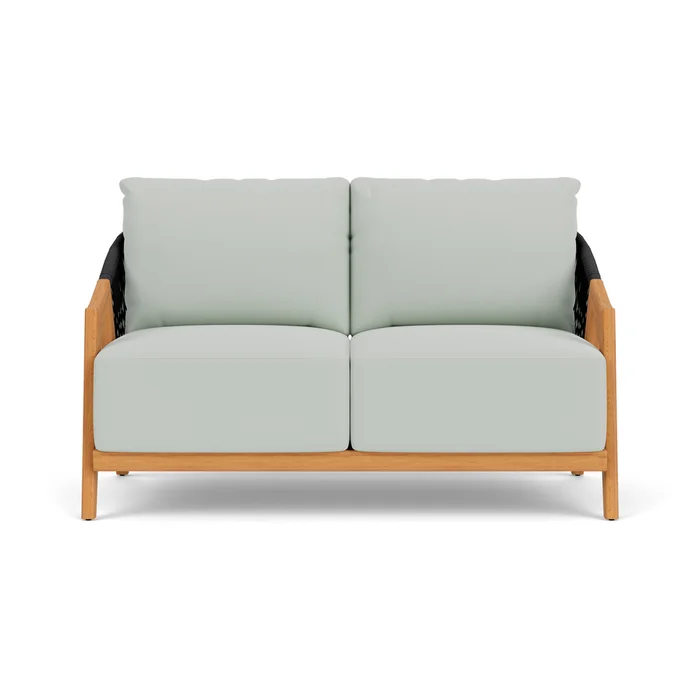 alpine loveseat in natural teak finish with callen celadon fabric grade b