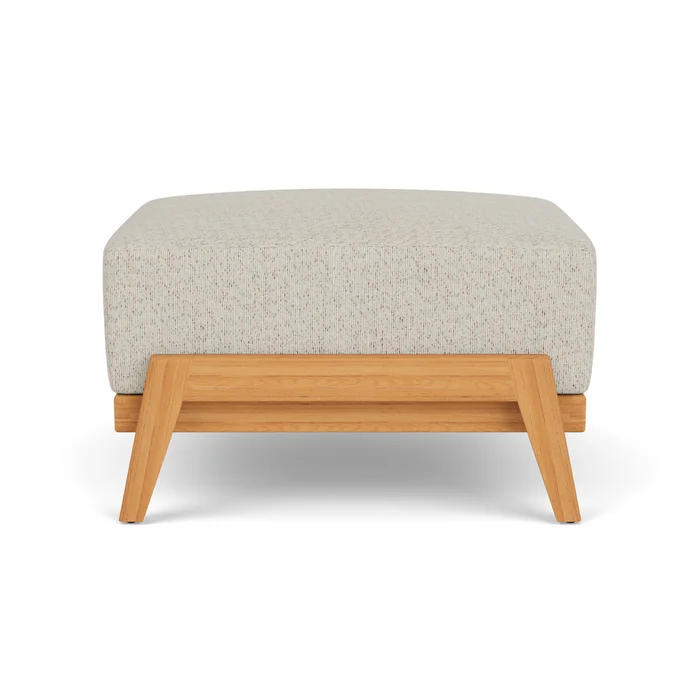alpine ottoman in natural teak finish with knotty mineral fabric grade c