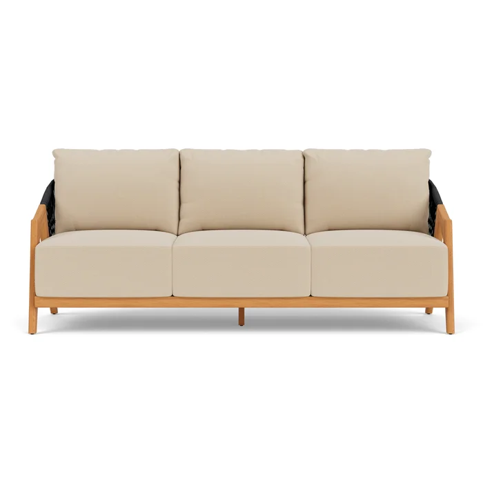 alpine sofa in natural teak finish with raindrop almond fabric grade b