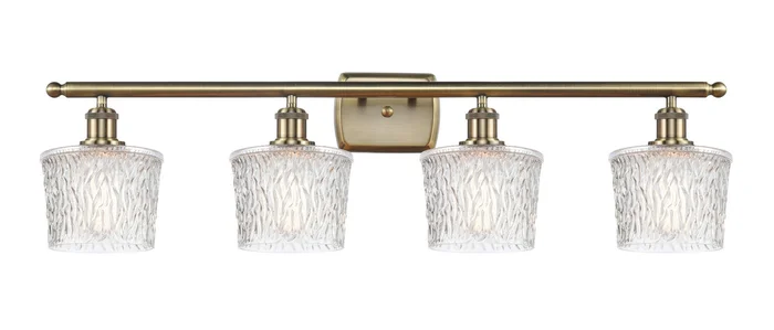 Ballston Four Light Bath Vanity in Antique Brass (405|516-4W-AB-G402)