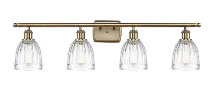Ballston Four Light Bath Vanity in Antique Brass (405|516-4W-AB-G442)