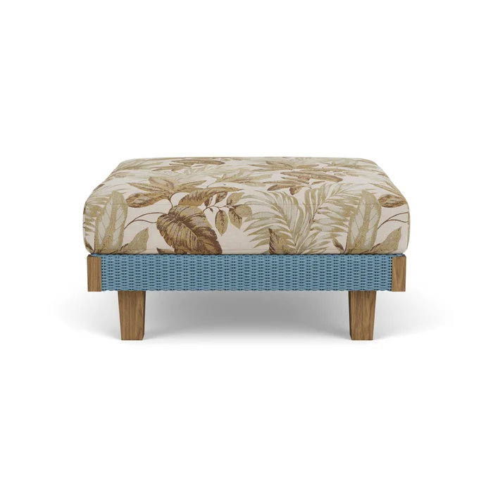 catalina ottoman in stillwater finish with botanic willow fabric grade d